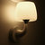 简约白色壁灯LED暖光现代客厅卧室床头灯创意造型儿童房灯海豚灯(白色单头 带5w光源)第2张高清大图