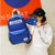 didas/阿迪达斯女包双肩包男包书包校园户外旅行包休闲运动韩版背包(蓝色)第4张高清大图