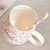 豪峰 创意马克杯陶瓷杯咖啡杯早餐杯牛奶杯卡通可爱水杯带盖勺(【粉色】【小斑点奶牛杯】【配盖勺】)第4张高清大图
