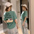 短袖t恤女韩版夏季2019新款学生宽松卡通小人印花体恤(绿色 XL)第5张高清大图