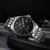 天梭(TISSOT)手表力洛克系列 T006新款80小时全自动机械时尚潮流精男表(银壳黑面银钢带罗马面)第4张高清大图