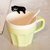 豪峰 创意马克杯陶瓷杯子咖啡杯牛奶杯早餐杯卡通可爱水杯带勺(黑猫浅绿款满天星带勺)第2张高清大图