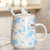 豪峰 创意马克杯陶瓷杯咖啡杯早餐杯牛奶杯卡通可爱水杯带盖勺(【蓝色】【中斑点奶牛杯】【配盖勺】)第3张高清大图