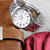 天梭(TISSOT)手表 梦幻系列 男士石英带日历经典商务钢带表T033.410.11.053.01(白色)第3张高清大图