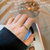 网红时尚戒指女麻花蝴蝶珍珠指环ins冷淡风小众设计夸张个性素圈(钛钢白贝（内直径约为1.85cm） 默认版本)第2张高清大图