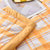 法莉雅家纺水洗棉夏被简约单人双人空调被学生薄被子XM(芒果格 180x220cm)第3张高清大图