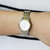 瑞士手表天梭(TISSOT)力洛克系列女款自动机械腕表镀金指针间金表带T41.2.183.34(金色 钢带)第5张高清大图