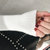 某织造 韩版百搭时尚修身基础针织打底衫ZHH60003(白色 均码)第5张高清大图
