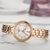 天梭(TISSOT)瑞士手表 弗拉明戈系列石英机芯 玫瑰金钢带女表女士商务T094.210.33.111.01(玫瑰金色)第2张高清大图