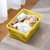 茶花透明收纳箱塑料有盖储物箱衣物整理箱衣服玩具大号加厚收纳盒(黄色 精致收纳箱-M)第7张高清大图