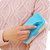 菲特美莱(Feitemeilai) 双轮静电除毛刷 除尘清洁刷床刷 多功能吸毛刷衣物粘毛器(蓝色 16*9*7cm)第2张高清大图