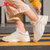 特步女鞋运动鞋冬季2021新款皮面防水休闲老爹鞋子跑步鞋女(米粉 39)第2张高清大图