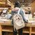 韩国ins可爱软妹童趣卡通少女书包 chic日系原宿学生双肩包女背包(白色)第3张高清大图