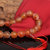 梦克拉Mkela 磨砂橙红色玛瑙手链把件 盛典 玉髓佛字圆珠手玩件第2张高清大图