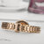 天梭(TISSOT)瑞士手表 弗拉明戈系列石英机芯 玫瑰金钢带女表女士商务T094.210.33.111.01(玫瑰金色)第3张高清大图