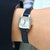 天梭(TISSOT)瑞士手表 乐爱系列钢带石英女士手表(灰色)第2张高清大图
