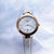 天梭(TISSOT)瑞士手表新款 弗拉明戈系列石英表女表 珍珠贝母表盘优雅时尚腕表(T094.210.26.111.01)第5张高清大图
