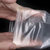 加厚透明一次性手套批发餐饮食品烘焙薄膜手套(默认 200只(0.6g/只）)第5张高清大图
