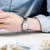 天梭/Tissot 瑞士手表梦幻系列钢带石英日历男士手表T033.410.11.013.00(女款银盘白面白带)第5张高清大图