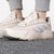 Adidas阿迪达斯男鞋 夏季新款运动鞋轻便舒适慢跑鞋老爹鞋透气减震跑步鞋休闲鞋GZ3814(米白色 44.5)第3张高清大图