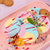 如迪【IUV爆款】香肠装冰淇淋2条(彩虹+海盐焦糖） 香蕉草莓泡泡糖三重口味,含太妃糖注心第6张高清大图